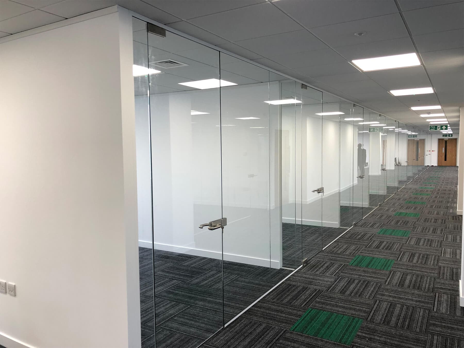 What Are the Cost Benefits of Using Glass Partitions in Offices?