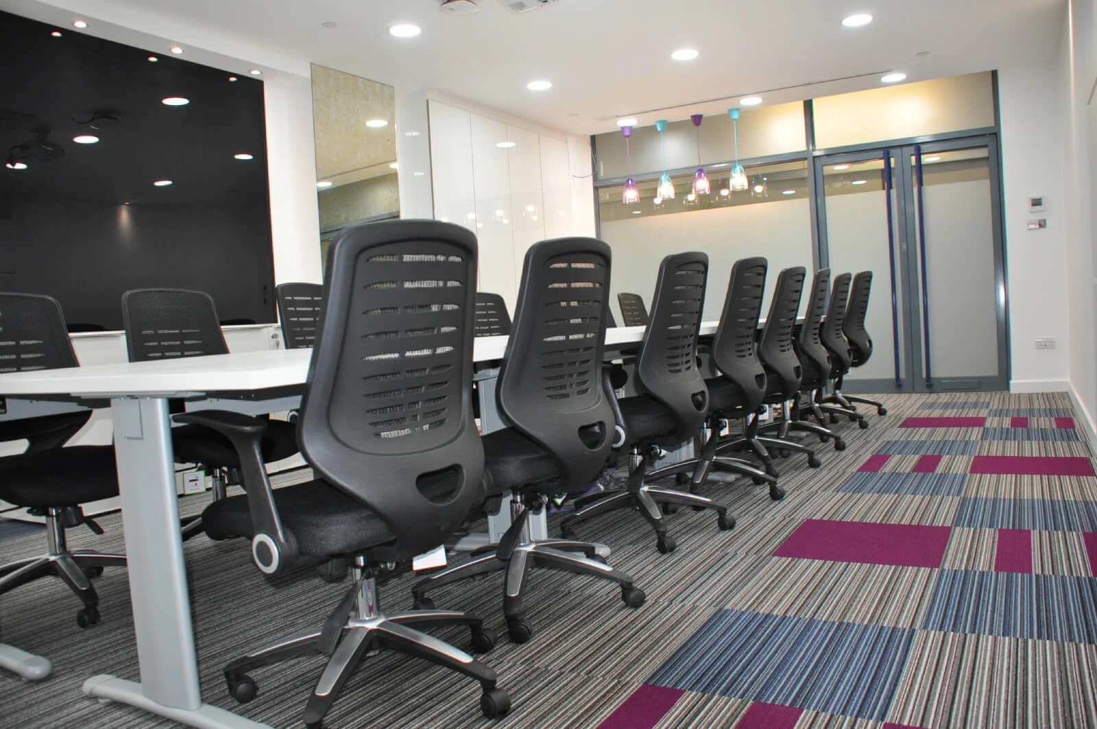 TSI office design with italian furniture designer flooring and glass partitions