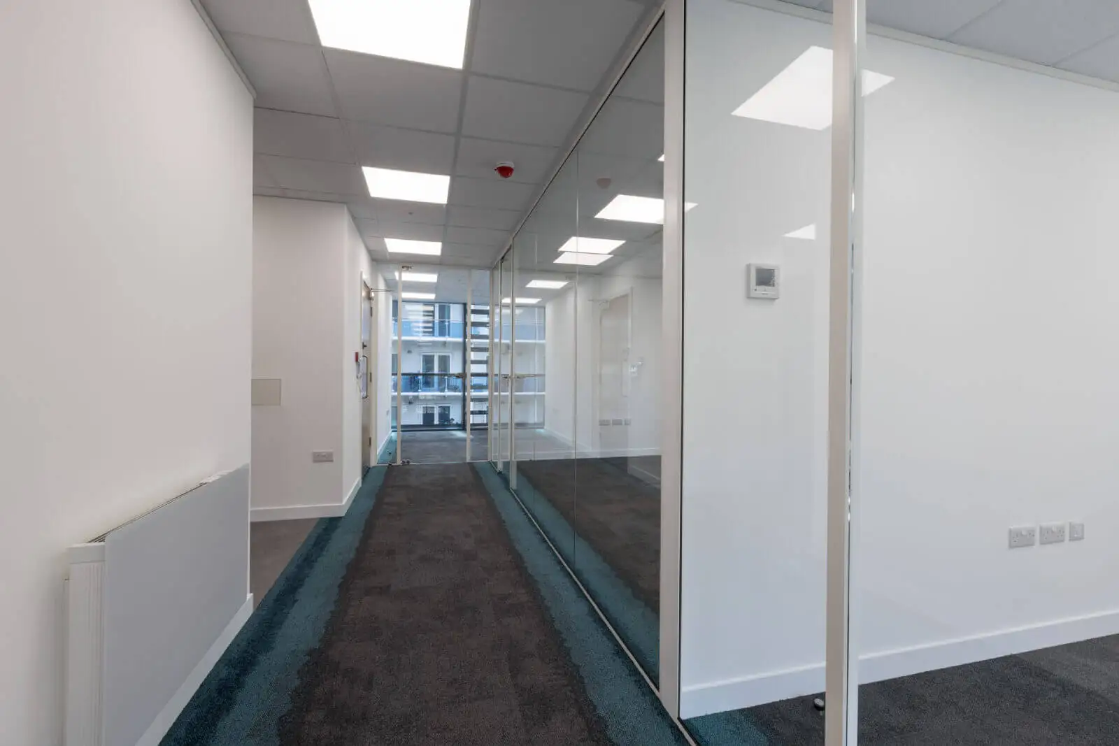 Godleys office space design with designer furniture and single glazed framed glass partitions 20