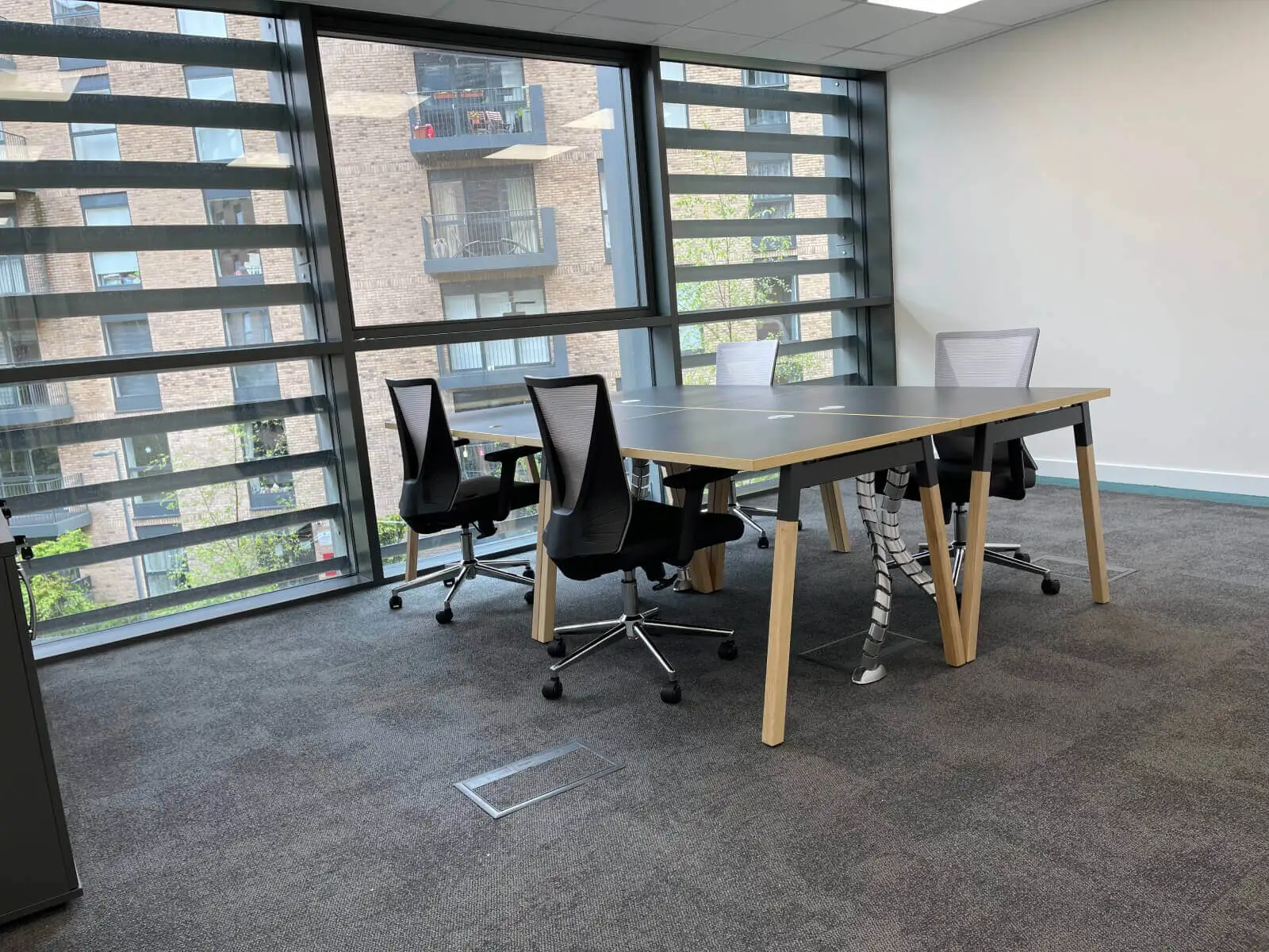 Godleys office space design with designer furniture and single glazed framed glass partitions 25