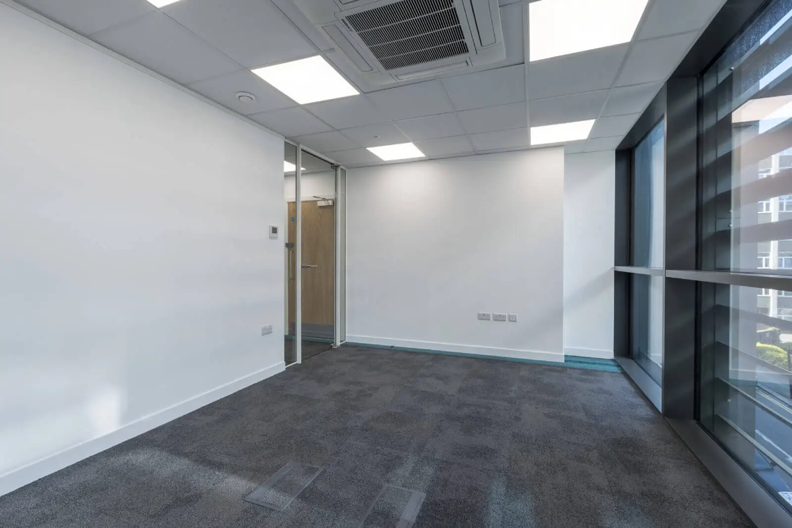 Godleys office space design with designer furniture and single glazed framed glass partitions 6