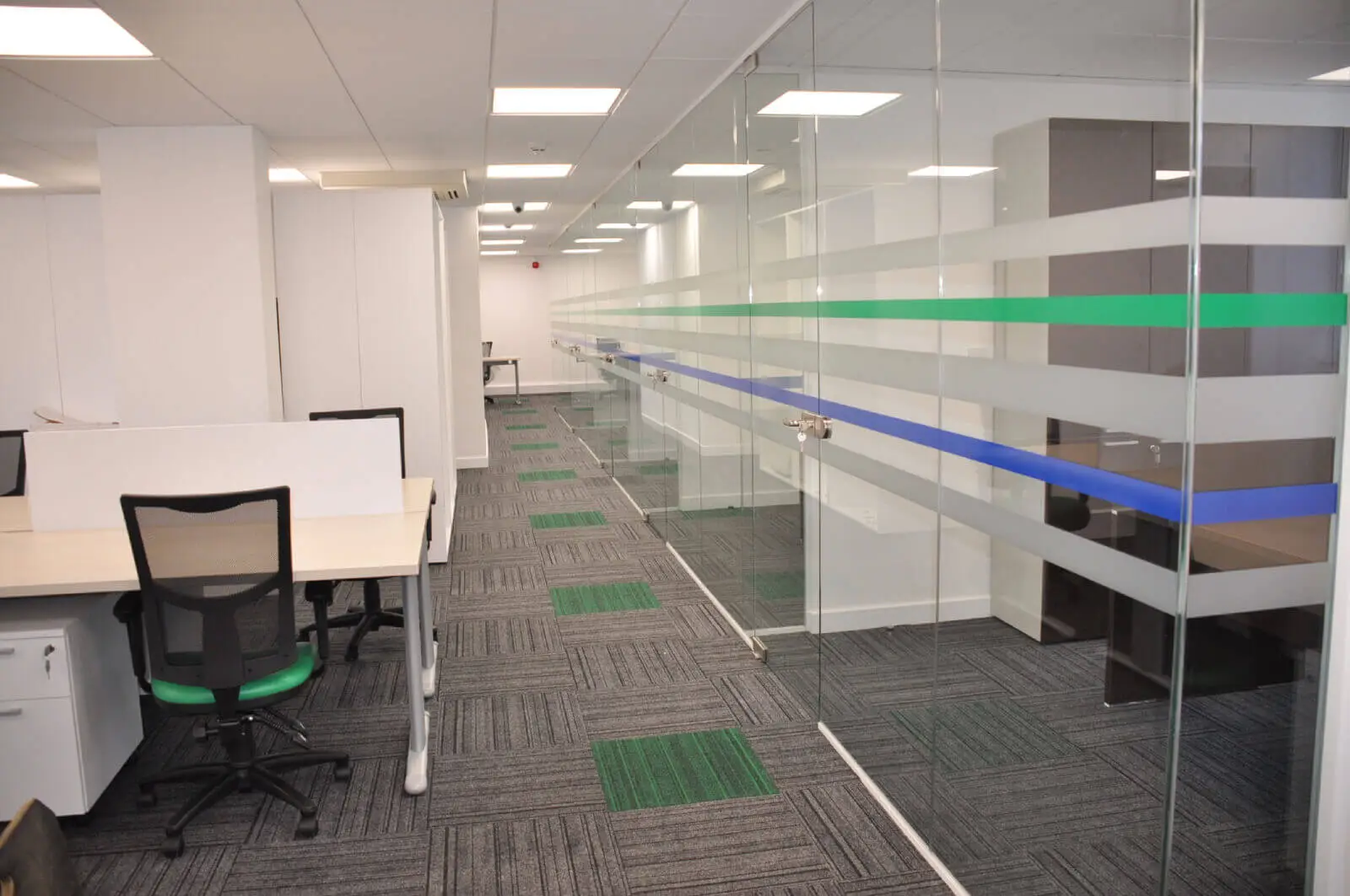 landau morely office design and refurbishment with single glazed glass partitions and furniture