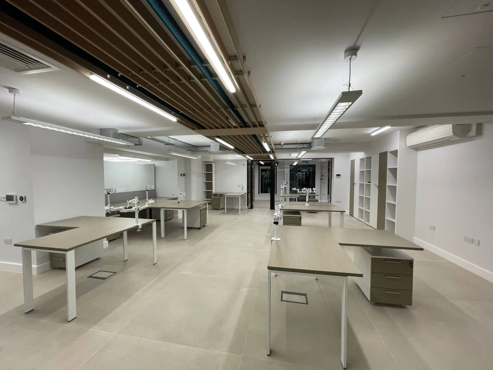 Deekay Group office space with deisgner furniture, walls and glass partitions 5
